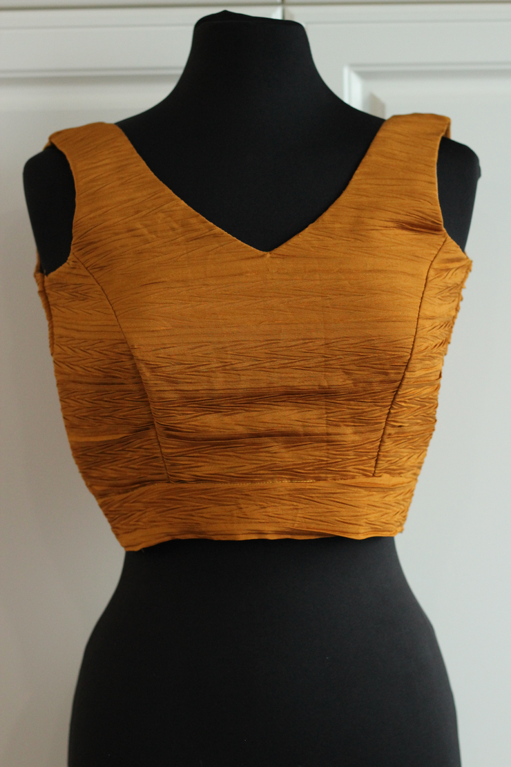 Our custom designed mustard pleated fabric sleeveless blouse - Size 34