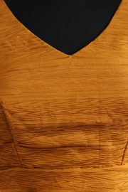 Our custom designed mustard pleated fabric sleeveless blouse - Size 34